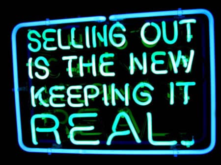 Sellout music culture, driven by practices such as payola, organized crime, and copyright scams, poses significant challenges to the music industry.